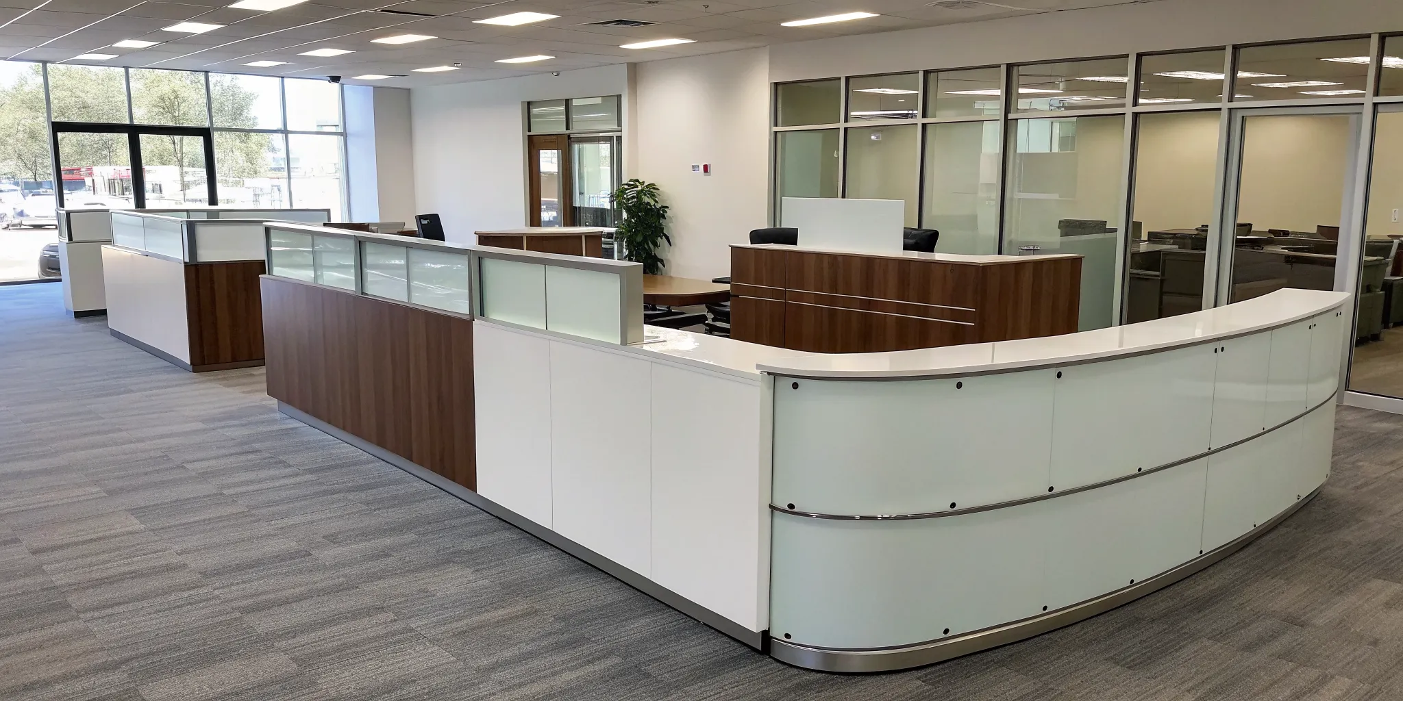 An affordable used reception desk in a modern office lobby.